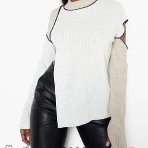 Exposed seam contrast sweater